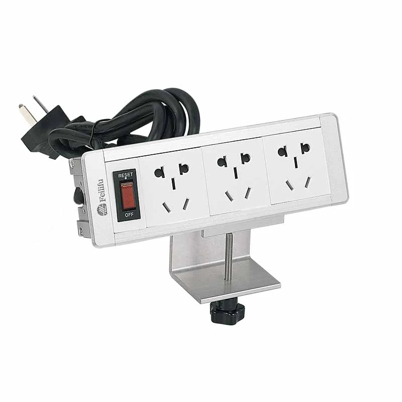 Irrotettava puristinkiinnityspöytään Power Strip -pistoke kannakkeella